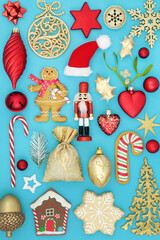 Christmas composition with ornaments, symbols and food on blue background. Abstract scene for the holiday season. Flat lay, top view.
