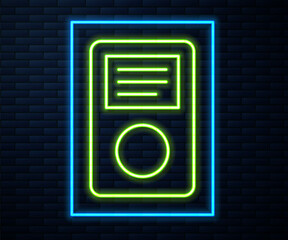 Glowing neon line Music player icon isolated on brick wall background. Portable music device. Vector