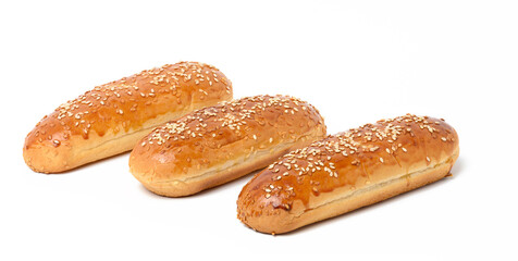 baked oblong sesame hot dog bun on white background, set