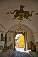 Entrance arch in a medieval castle, now the town hall of Lavello, old town in basilicata region, Italy.