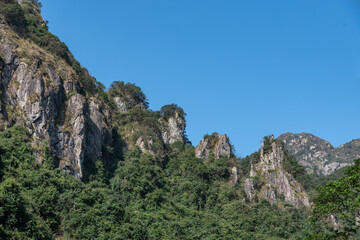 Fototapeta na wymiar Grotesque stones in the mountain scenic spot