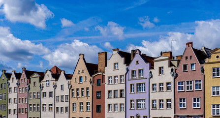 colorful house fronts of row houses on the riverfront of the Motlawa River in the Old Town of Gdansk