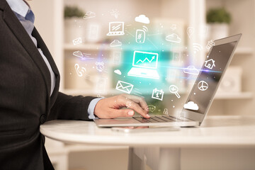 Businessman working on laptop with new business concept