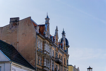 typical Gothic architecture brick building in downtown Gniezno with elaborate architectural details