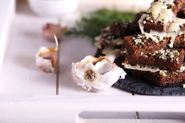 croutons with garlic and herbs are on the table