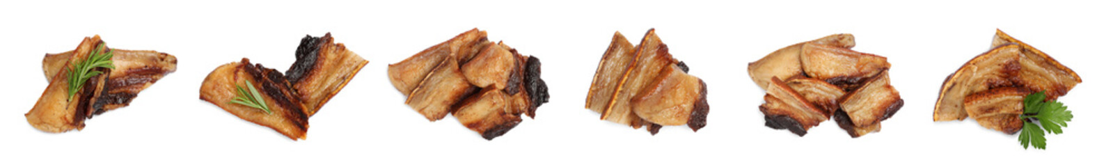 Set with tasty fried pork lard on white background, top view. Banner design