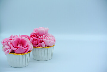 Jelly pink flower cupcake 1 in white background for copy space