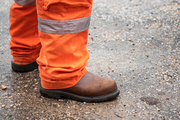 A part of operation staff which is wearied fully PPE such as leather safety shoe and coverall suit....