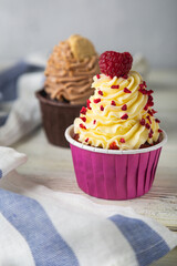 Cupcake. Sweet dessert with cream