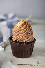 Cupcake. Sweet dessert with cream