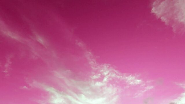 Fantasy clear pink sky background n fluffy clouds