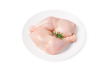 Fresh chicken legs.Top view Two raw whole chicken legs on a white plate on a white isolated background.