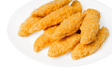 Fast pre cooked, homemade food.Fast food.Chicken breaded nuggets on a white plate.Raw chicken fillet inner, sprinkled with bright breading.