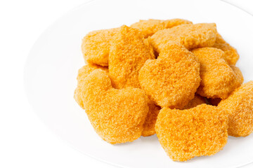 Fast homemade food.Fast food.Chicken breaded nuggets on a white plate.