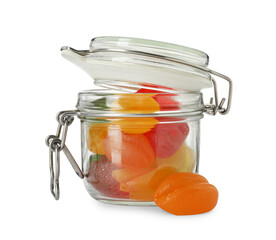 Delicious gummy candies in glass jar on white background