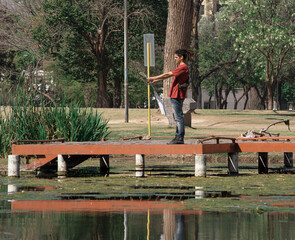 Man lose at the park looking a map