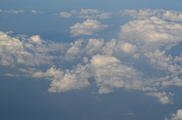 Fototapeta na wymiar Clouds - view from plain travel
