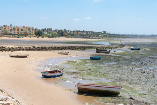 Fishing boats on the Cachucha beach in Puerto Real, Cadiz. Andalusia, Spain. Europe.
