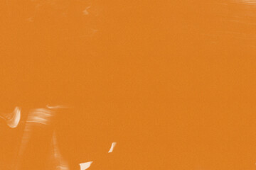 Christmas golden background with paint textured effect. Horizontal Xmas shiny gold web banner with metallic texture close-up. Abstract rich pattern. Brushed gold foil image for Christmas decoration.