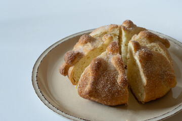 Bread of the dead broken into pieces to share