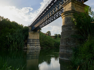 View of the Xativa - Alcoy railroad bridge over the Albaida river, Spain.