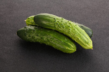 Fersh juicy green cucumbers heap