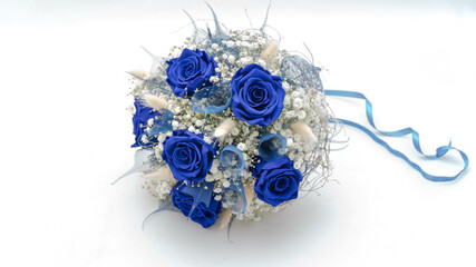 Wedding bouquet made of blue roses isolated on a white background