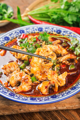 A Chinese delicacy: boiled fish