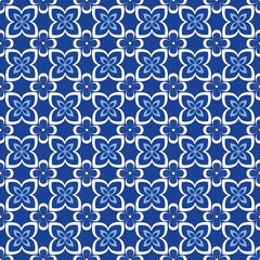 Blue white seamless background with flowers..Abstract, repeating regular pattern for print..Graphic design with regular shapes.