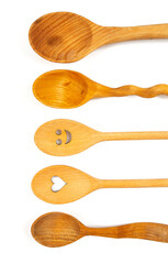 empty wooden spoons isolated on white background
