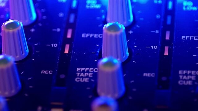 Portative cassette tape studio mixer. Panoraming from left to right.