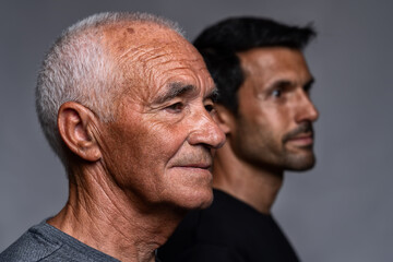 Descendants of the older generation of Europeans, concept in portrait. The old man and his son...