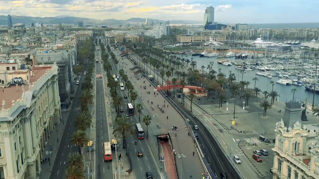 BARCELONA, SPAIN - Mar 28, 2016: Spain, Barcelona, an aerial time-lapse of traffic on Ronda Litoral With Passeig de Colom
