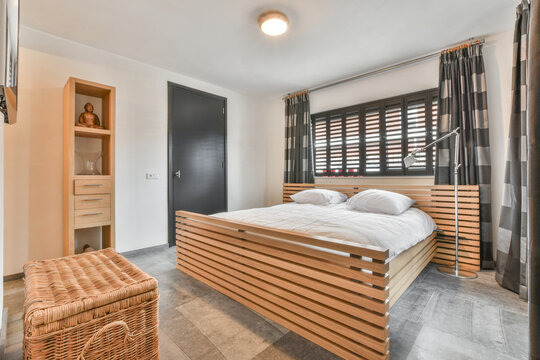 Interior of bedroom with wooden furniture