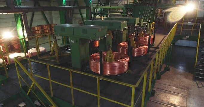 Wire rod continuous casting line during operation, inside the copper wire rod production workshop, frame from a drone
