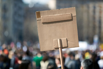 Protesters holding placards and signs on the streets. - obrazy, fototapety, plakaty