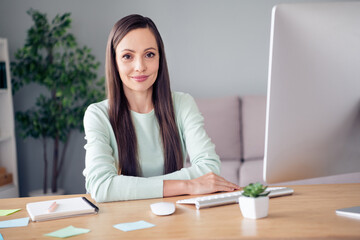 Portrait of attractive cheery skilled woman company consultant preparing finance growth plan report economy at home indoors