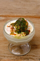 Dahi wada or dahi bhalla. This is delicious indian style food.