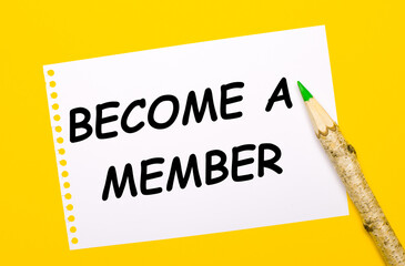 On a bright yellow background, a large wooden pencil and a white sheet of paper with the text...