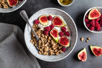 Greek yogurt with granola, figs, raspberries and honey.