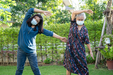 Asian senior or elderly old lady woman patient exercise with happy fresh enjoy in park, healthy...