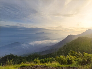 Fototapeta premium a mountain range view in the morning. the view while waiting for the sun to rise from the east. beautiful morning view in the mountain.