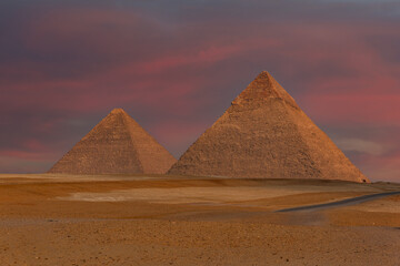 Fototapeta na wymiar Two great Egyptian pyramids on the plateau of Giza under a picturesque sky