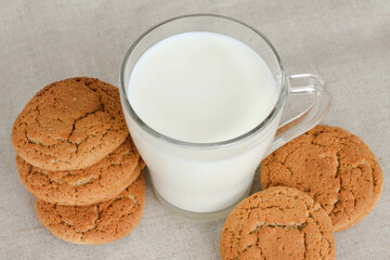 oatmeal cookies with a glass of milk, top view, flat lay, text space. 