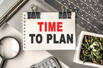 TIME TO PLAN text on a notepad and laptop, office tools. Business, financial concept. remote training. Coffee break, ideas, notes, goals or writing a plan, invitation concept. Top view, flat lay.