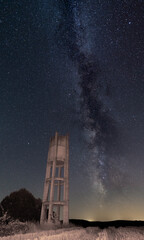 Water tank near the crop under the milky way