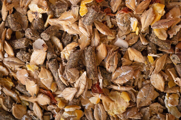 background of basical muesli for  horses. feeding and horse care concept. macro. top view
