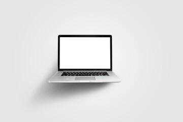 New laptop display with keyboard and blank white screen isolated on a white background.