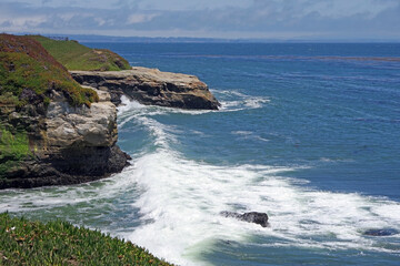 Fototapeta na wymiar View of the California coastline in summer looking south at the Santa Cruz bay
