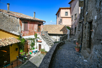 Fototapeta na wymiar A narrow street in Anguillara sabazia, an old town in Lazio region, Italy.